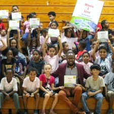 At Rally, Students From Eulalie Rivera And Alfredo Andrews Motivated To ‘Read Five’ In 10th Annual Summer Reading Challenge